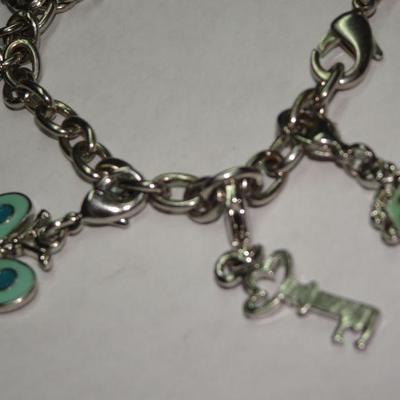 Child's Charm Bracelet, Butterfly, Bows, Dragon Fly, Shirt, charms. 