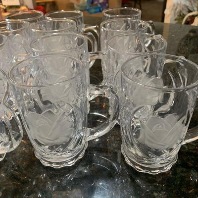 Lot 169. Set of 12 glass mugs with rose design 