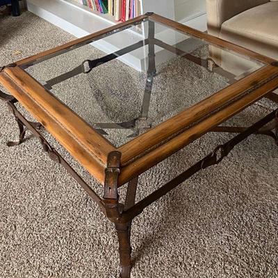 Lot 191. Glass and wood coffee table