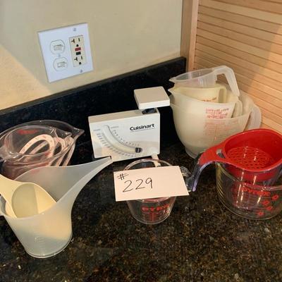 Item 229 Various measuring cup and scale