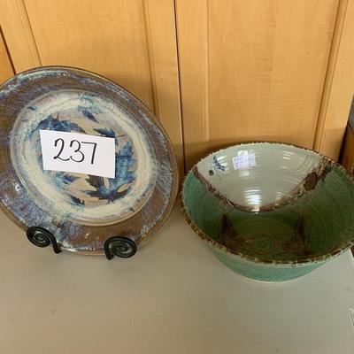 Lot 237. two pottery bowls and heavy metal stand