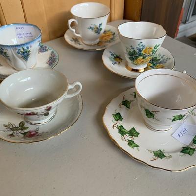 Lot 239. Tea cups and saucers (5 sets)