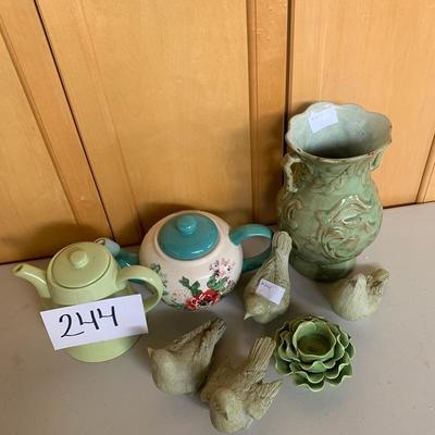 Lot 244. Tea pots and bird deco