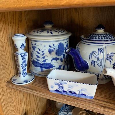 Lot 249    blue and white home decor items including two tea pots