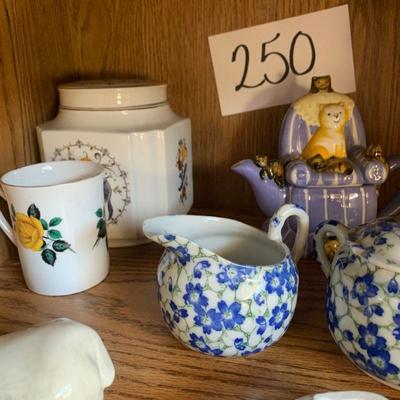 Lot 250   miscellaneous home decor items including cat teapot and blue and white salt and pepper shakers