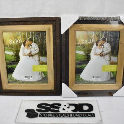 Two 8x10 Wooden Frames. 1 new 1 used