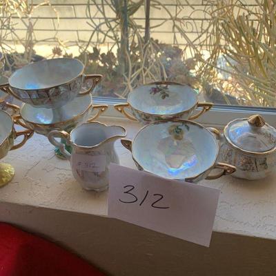 Lot 312. Porcelain cups and variety of porcelain 