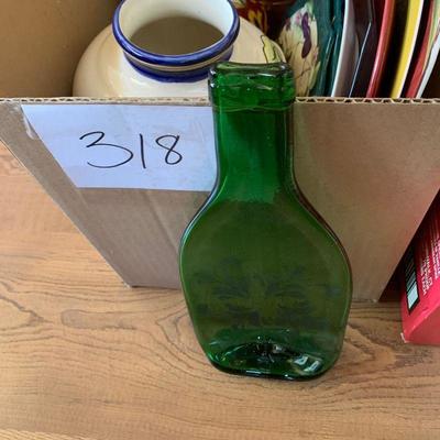 Lot 318. Vase, bottles and plates