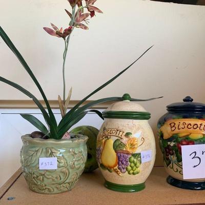 LOT 372. BISCOTTI JARS AND A PLANT