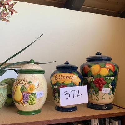 LOT 372. BISCOTTI JARS AND A PLANT