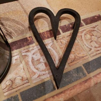 Lot 75: Candle and cast Iron Heart Deco