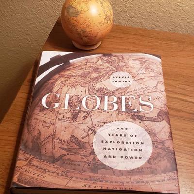 Lot 88: Globes Book with small Decorative Globe