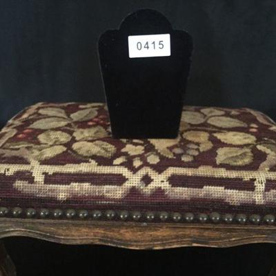Antique foot stool with lovely needlepoint cover. #415