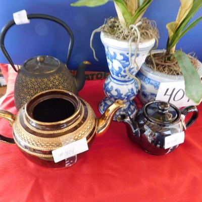 Lot 404 3 tea pots, pot with artificial plants