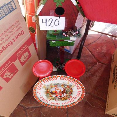 Lot 420 Christmas decorated birdhouse on a stand metal Christmas plate and two Christmas candle sticks