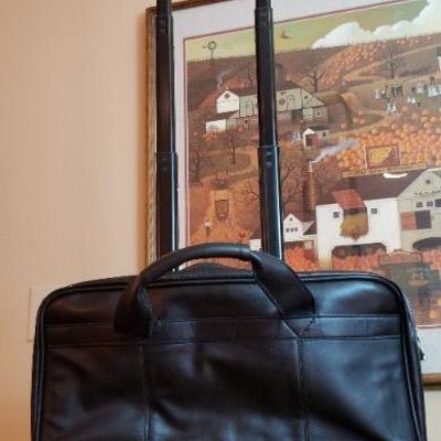 LOT # 187: SOLO Black Leather Travel Bag