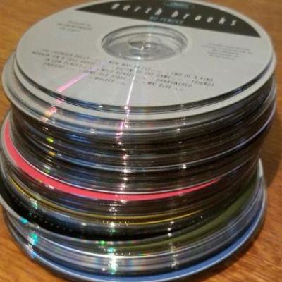 LOT #243: Assorted Loose Audio Cd's: Garth Brooks, Rolling Stone, Buddy Holly and MORE!
