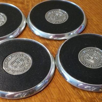 LOT #245: Vintage Leather and Chrome Plated 1996 Medical Center Presentation Coasters