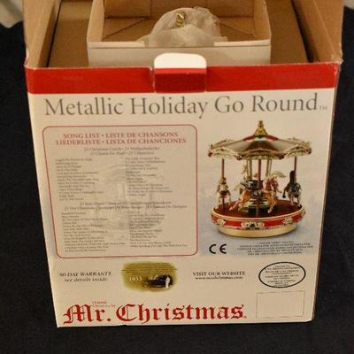 Lot 79:  Mr. Christmas Metallic holiday go round