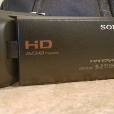 LOT #39: Vintage SONY HDR-CX240 Camera w/ Bag and Accessories