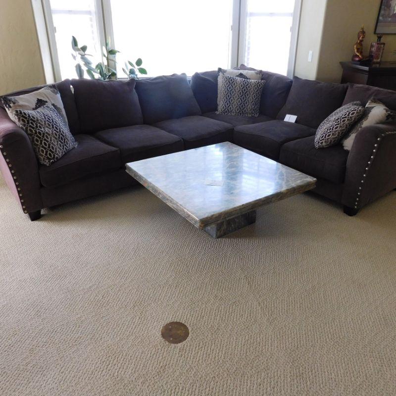 Lot 1 dark gray sectional sofa with four decorative pillows