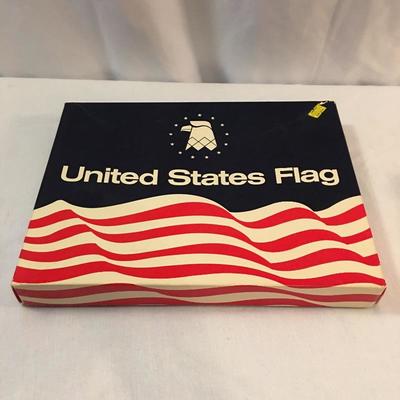 Lot 13 - Cast Iron Trivets & U.S Flag
