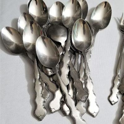 Lot #75  Large Set of Oneida Deluxe "Distinction" Stainless Flatware