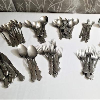 Lot #75  Large Set of Oneida Deluxe "Distinction" Stainless Flatware