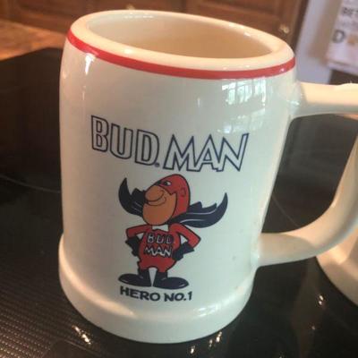 Two Budman mugs