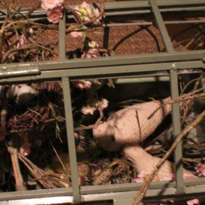 LOT #282: Large Home deco Bird Cage w/ artificial floral arrangement inside.