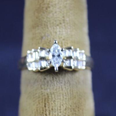 LOT#J37: 14K Plumb Marquis & Baguette Ladies Diamond Ring