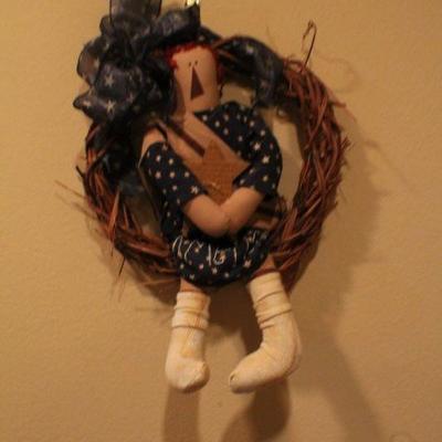 LOT #322: Decorative Wreath w/ Star Fitted Figure inside