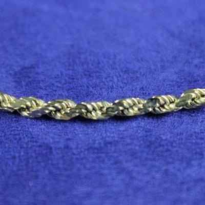 LOT#J52: 14K Diamond Cut Rope Bracelet