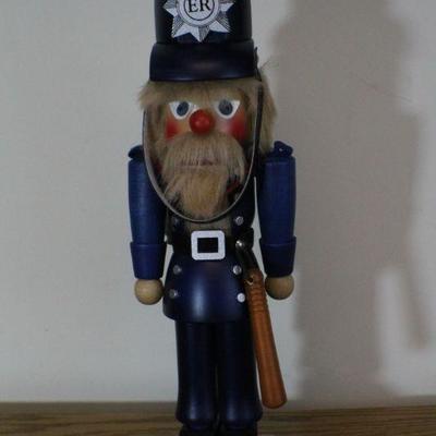 LOT #335: CHRISTIAN ORIGINALSâ„¢ Police Officer w/ Baton Nutcracker Home deco 