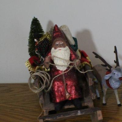 LOT #336: Santa Claus on Sleigh Delivering Presents w/ Reindeer 