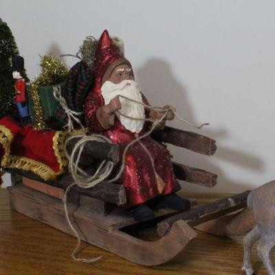 LOT #336: Santa Claus on Sleigh Delivering Presents w/ Reindeer 