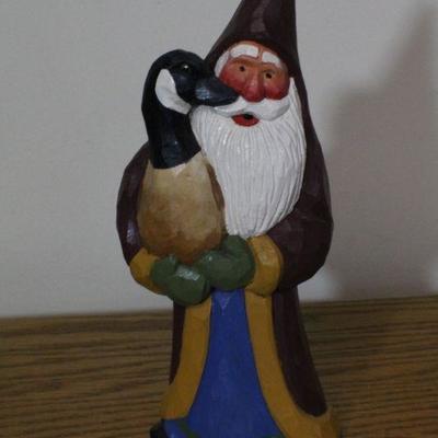 LOT #338: Handmade Santa Claus Figure holding goose by Susan M. Smith 