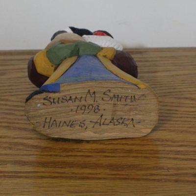 LOT #338: Handmade Santa Claus Figure holding goose by Susan M. Smith 