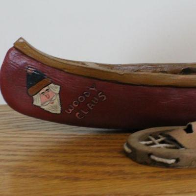 LOT #342: Woody Claus Canoe w/ Snow Shoes for Fast Delivery to Remote Homes