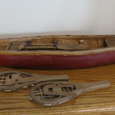 LOT #342: Woody Claus Canoe w/ Snow Shoes for Fast Delivery to Remote Homes