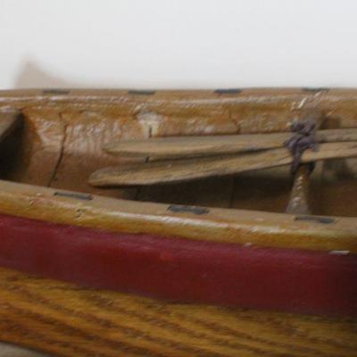 LOT #342: Woody Claus Canoe w/ Snow Shoes for Fast Delivery to Remote Homes