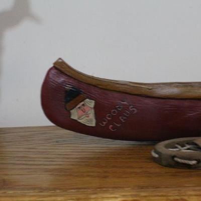 LOT #342: Woody Claus Canoe w/ Snow Shoes for Fast Delivery to Remote Homes