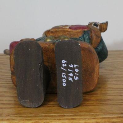 LOT #343: Handmade Wood Carved Santa Claus Rescuing Deer 