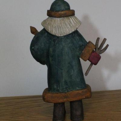 LOT #343: Handmade Wood Carved Santa Claus Rescuing Deer 