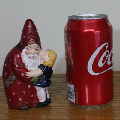 LOT #349: Girl Kissing Santa Claus MONIâ„¢ Home Holiday Deco 