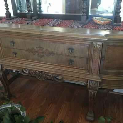 Ornate solid wood buffet and matching dining table and chairs!