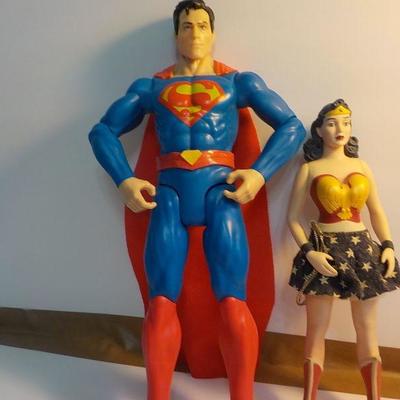 "Superman and Wonder women dolls.