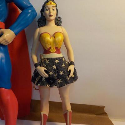 "Superman and Wonder women dolls.