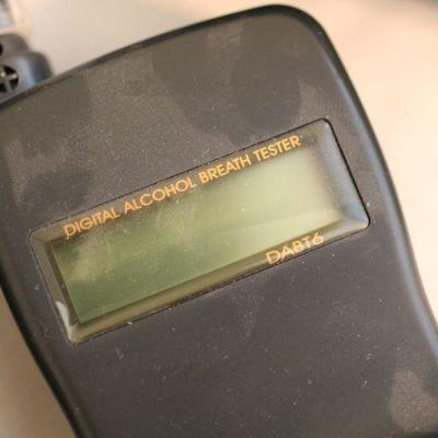 Lot 61 Camera, Labeler, Alcohol Breathalyzer