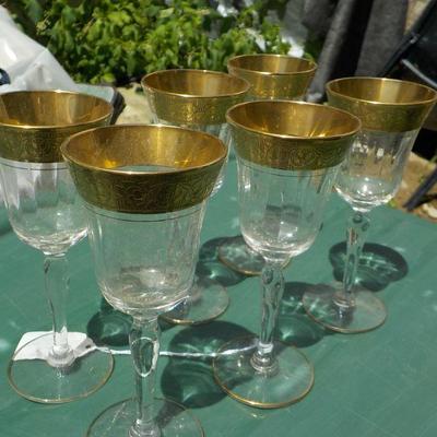 6 Elegant Crystal with gold engraved wine gobbets . 
